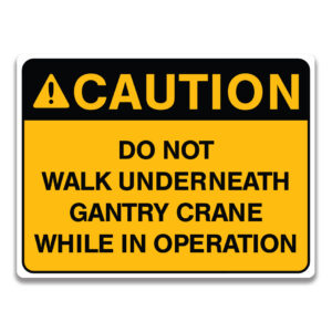 DO NOT WALK UNDERNEATH GANTRY CRANE WHILE IN OPERATION SIGN