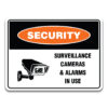 SURVEILLANCE CAMERAS & ALARMS IN USE Sign